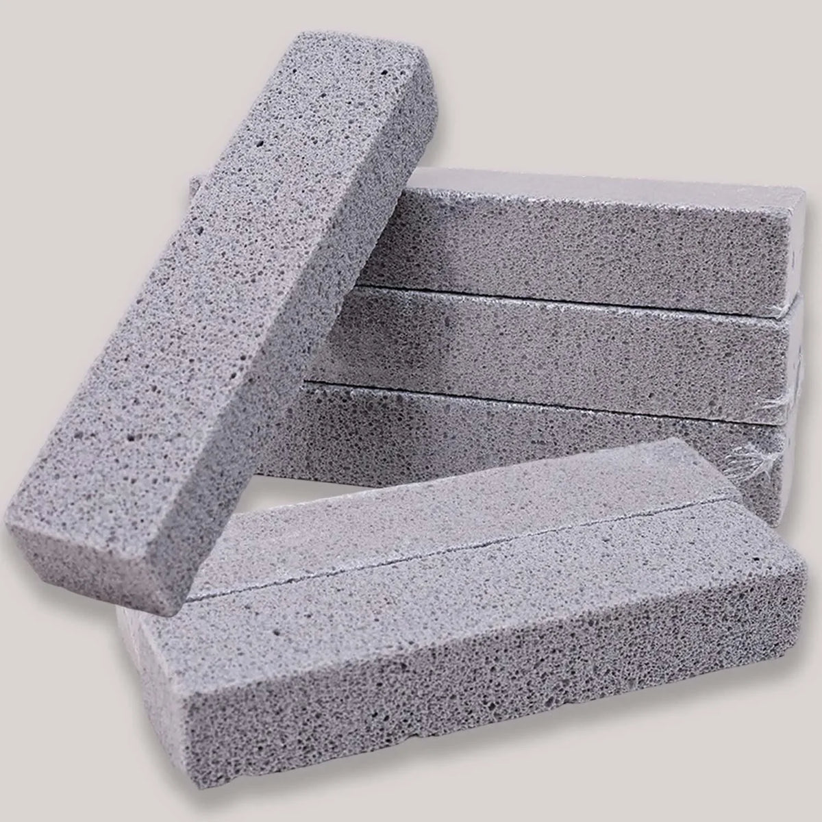Stack of gray pumice stone cleaning sticks for bathroom and kitchen use