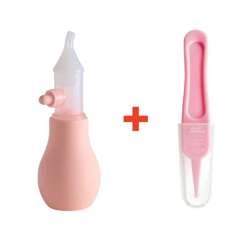 A pink gentle baby nasal aspirator with a silicone tip and a clear plastic container.