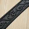 Black embossed decorative trim or molding for wall panels