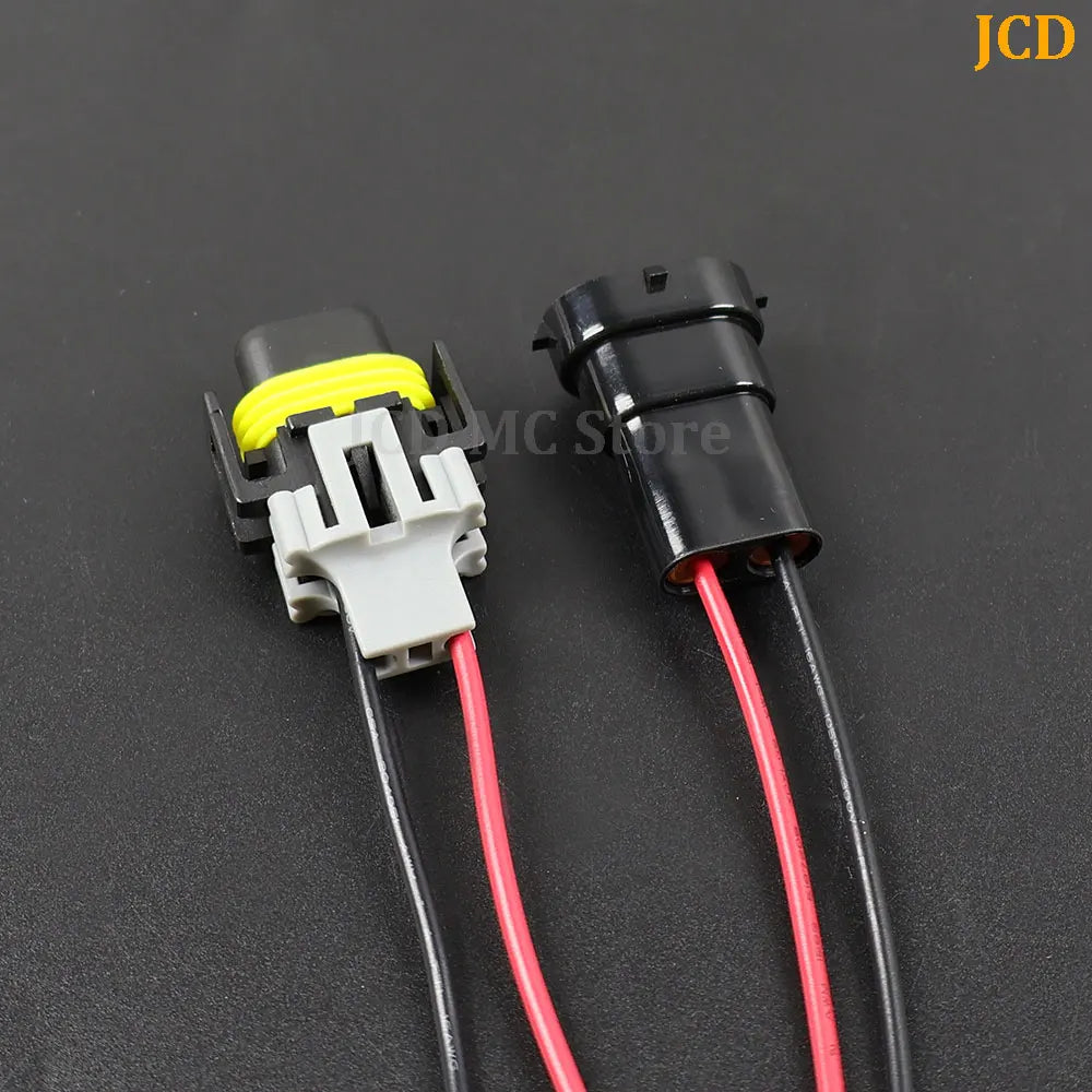 Wiring harness for H8/H11 headlight adapter with a yellow connector and red wires