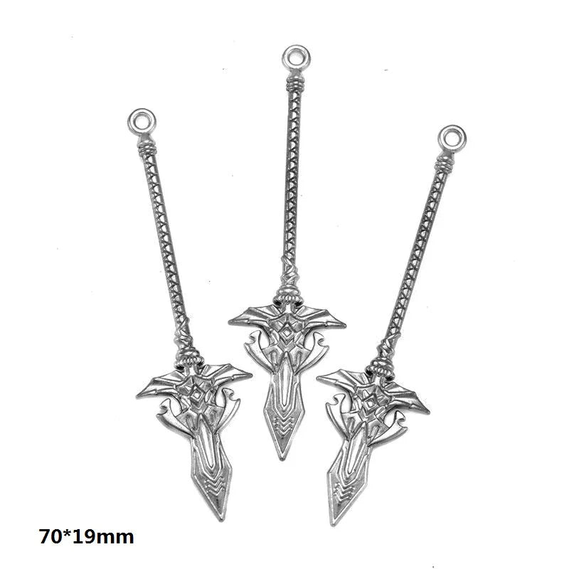 A set of 16 gun-shaped charms for DIY jewelry making in silver metal.