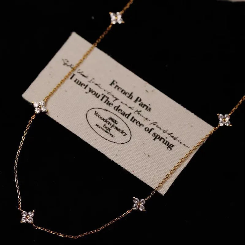 Dainty Lucky Leaf Necklace with White CZ Flowers