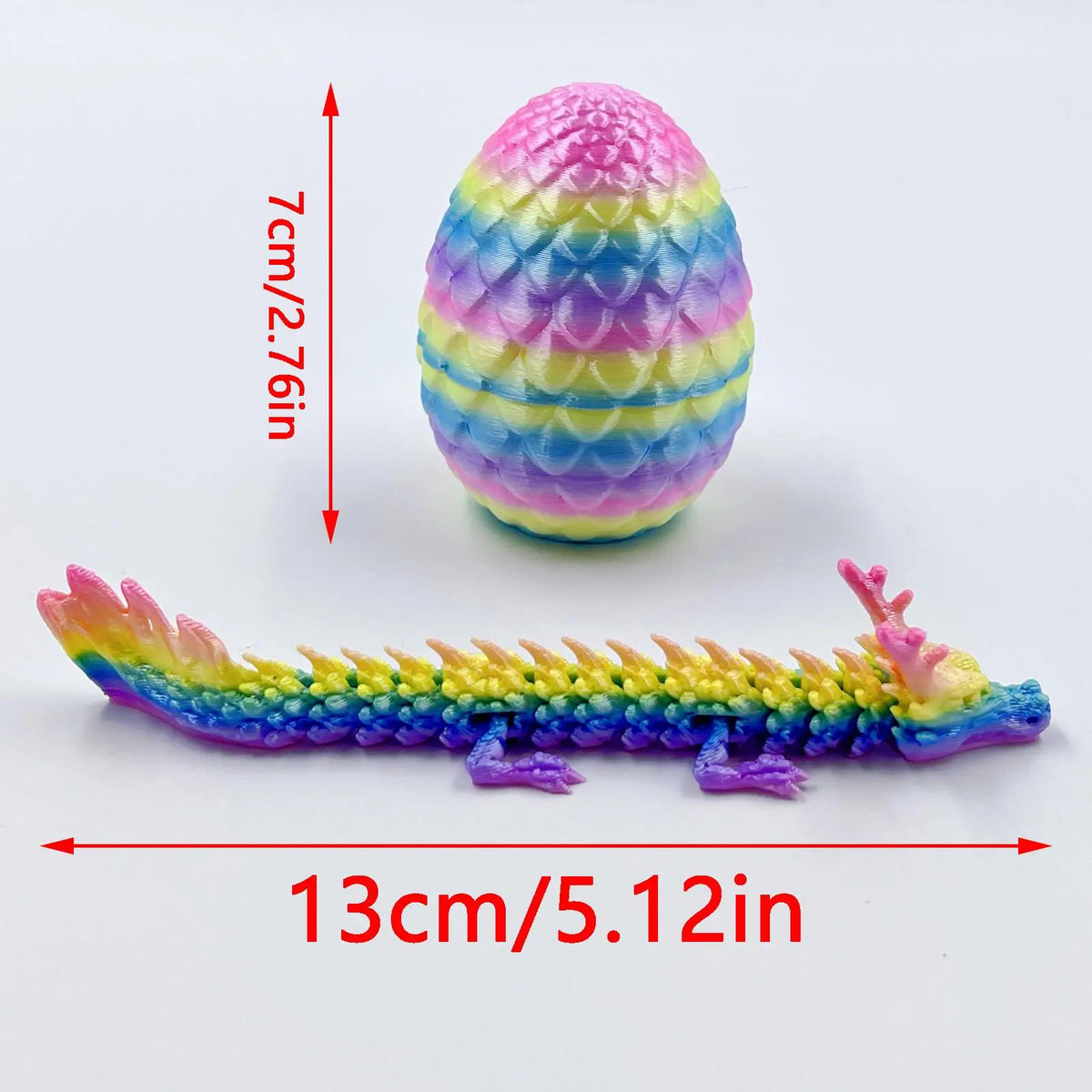 A colorful dragon sculpture and an egg sculpture are displayed with their respective dimensions.