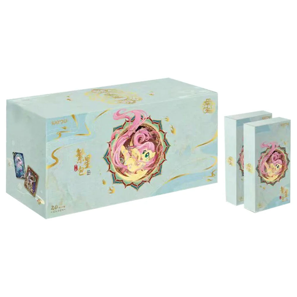 A box of My Little Pony Friendship Eternal Radiant Moon Gilded Card Pack featuring a pink, swirling design on a light blue ba