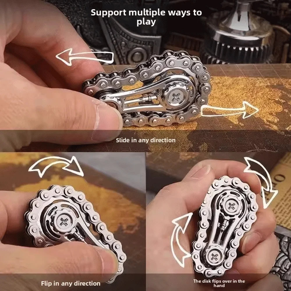 A hand demonstrates the multi-directional movement of a silver sprocket fidget spinner toy.