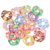 A collection of colorful acrylic spacer beads in various shades and wave patterns for jewelry making