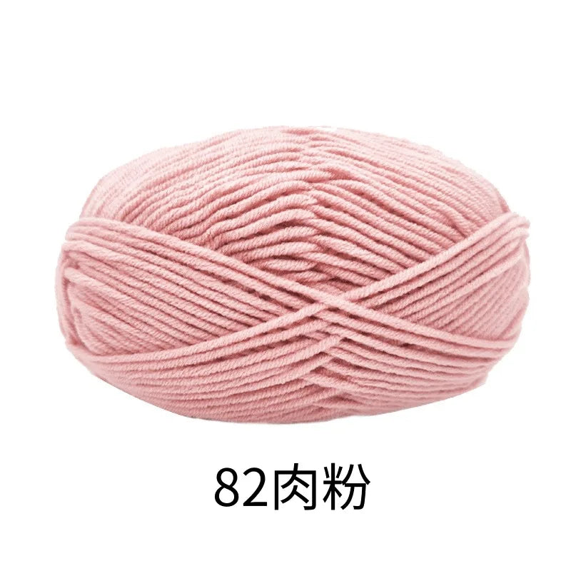 A ball of pink 4-ply milk cotton yarn for knitting and crochet