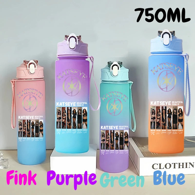 Three 750ml portable sports water bottles in pink, purple, green, and blue colors displayed on a white surface.