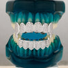 مجموعة أسنان ذهبية صلبة (Grillz)