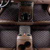 Interior view of a car showing premium PU leather floor mats and seat covers with red stitching.