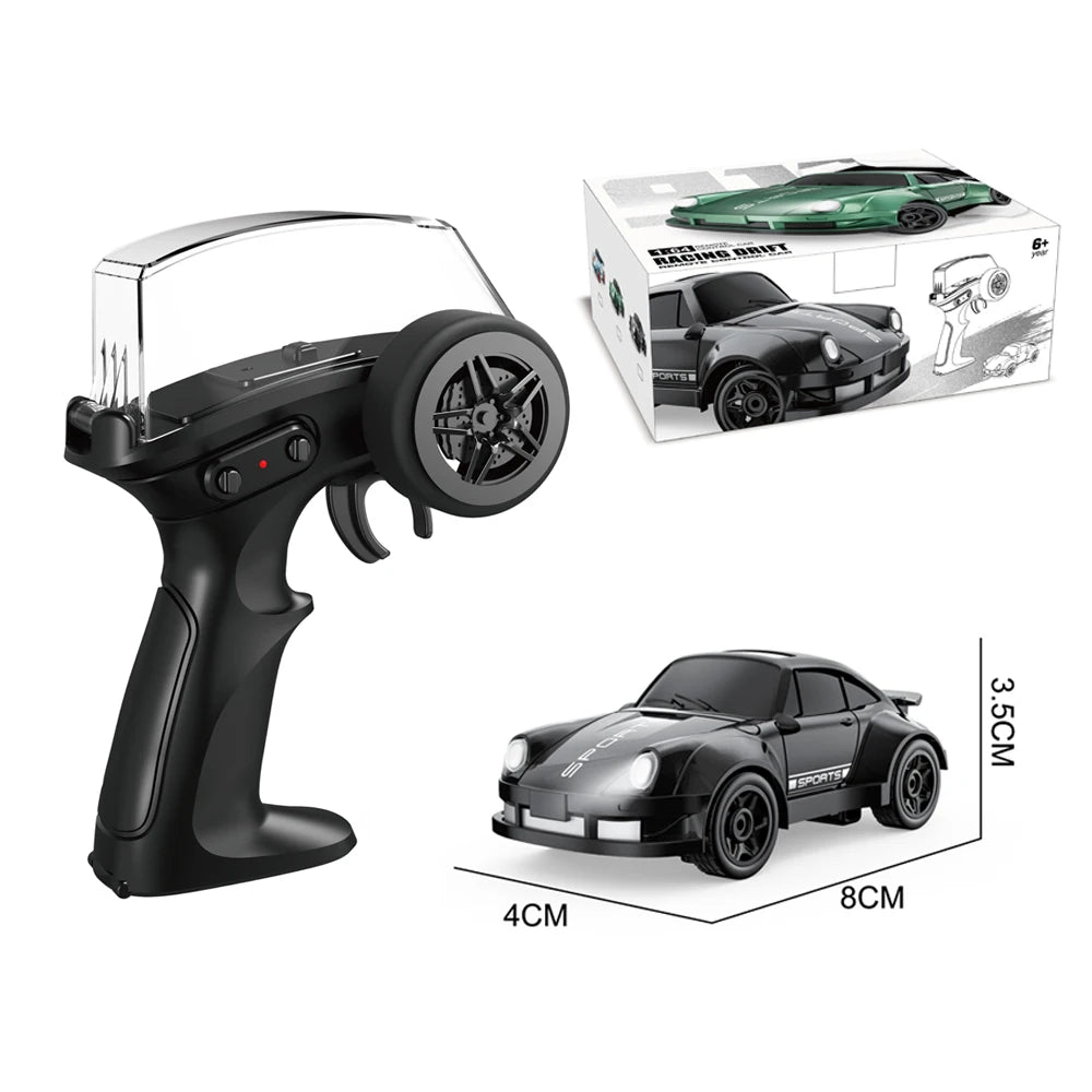 A black RC drift car and its accessories are shown next to its packaging box.
