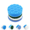 A set of blue, green, and white cleaning brush heads including a sponge, scouring pad, and polishing discs.