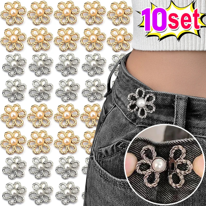 A set of adjustable flower waist clips in gold and silver tones for pants and jeans.