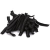 A pile of black disposable non-woven hair net caps.