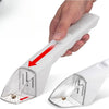 A hand holds a white handheld insect catcher with a telescopic handle, showing the clear collection chamber.