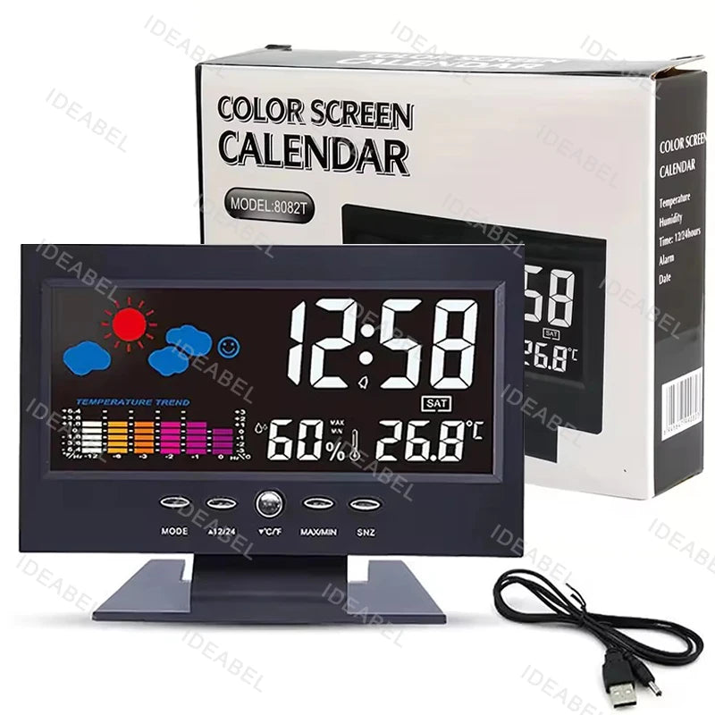 A digital weather station clock showing 12:58, temperature, and humidity, packaged in a box.