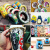 A hand holds a colorful cup featuring Japanese-style artwork and characters.