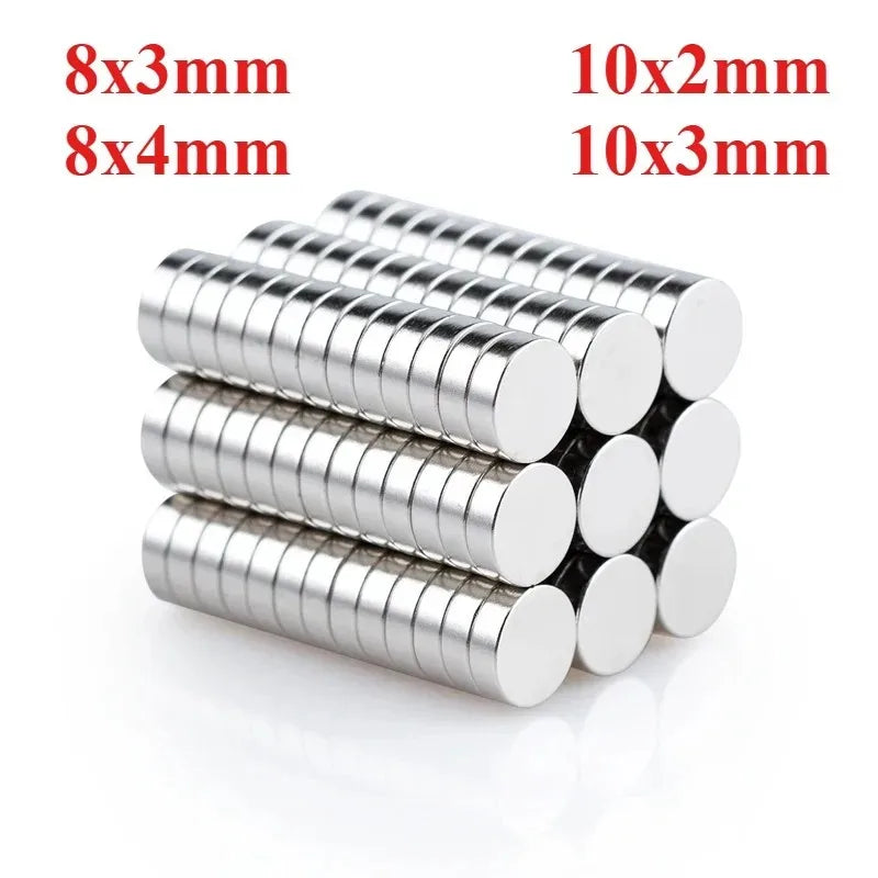 A collection of silver magnetic stickers in various sizes, including 8x3mm, 8x4mm, 10x2mm, and 10x3mm.