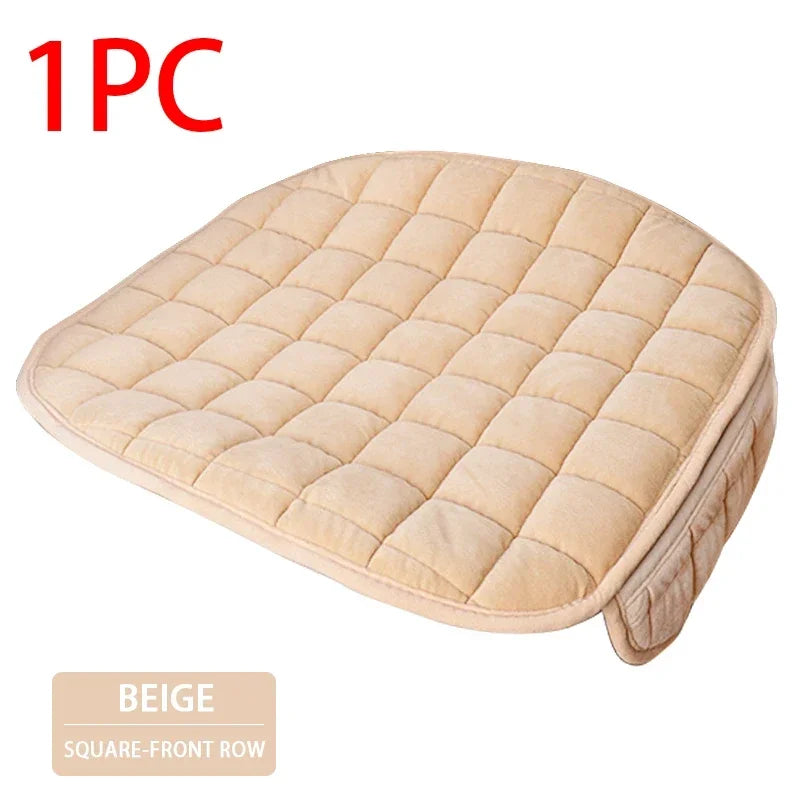 One beige quilted square-front row car seat cover for universal anti-slip protection.