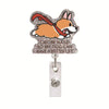 Glitter acrylic badge reel featuring an orange and white fox design with text on a clear background.
