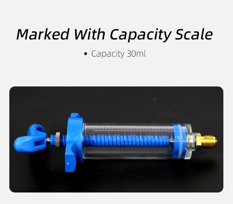A blue air conditioning oil and dye injector with a capacity scale, shown horizontally on a black background.