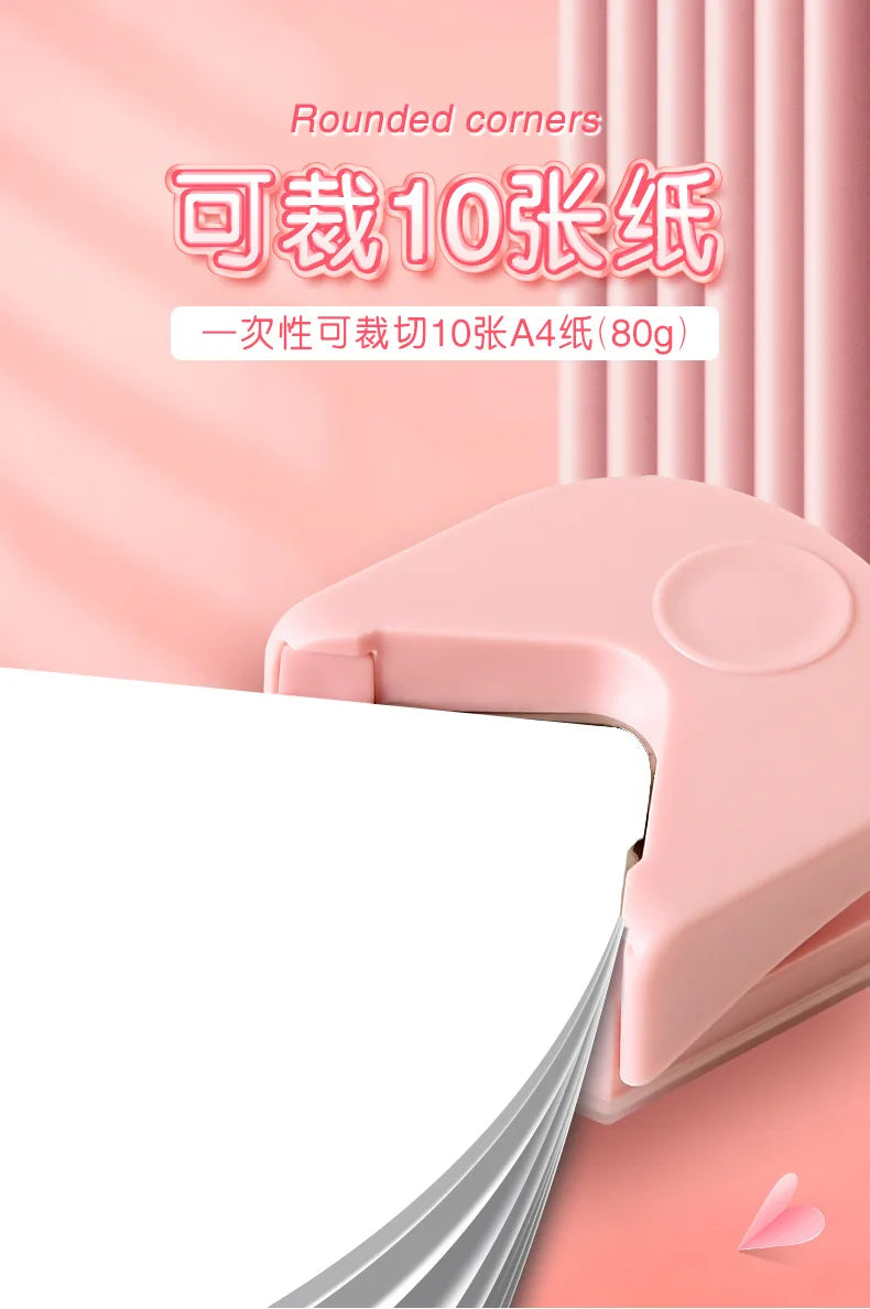 A pink rounded corner cutter tool is shown next to a stack of white paper, demonstrating its use for cutting 10mm A4 sheets.