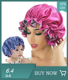 A model wears a pink double-layer satin hair bonnet while a baby wears a blue version.