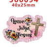 Pink acrylic hair bow decorations featuring a leaf design and a cross with floral accents.