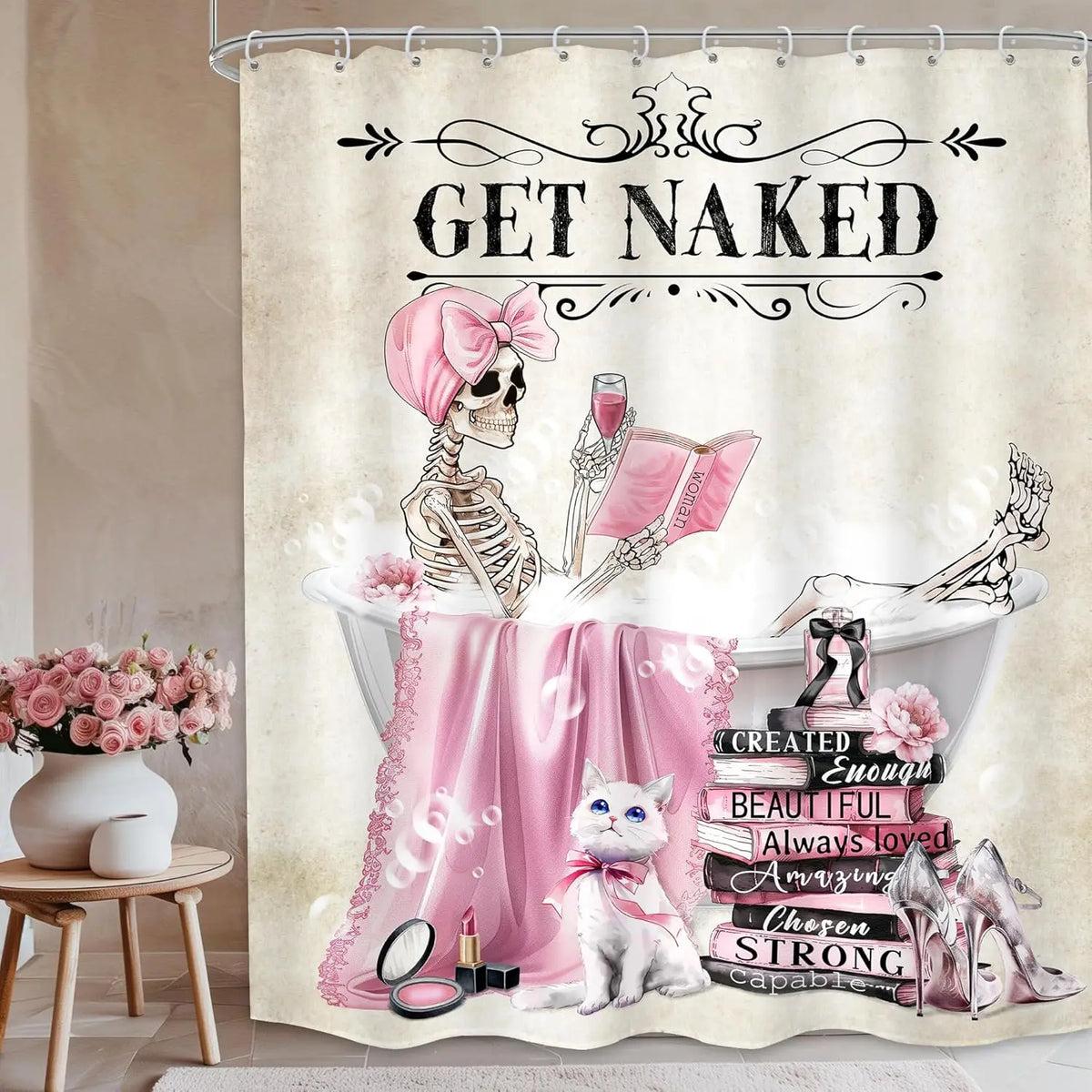 A shower curtain featuring a gothic skull design with pink floral accents and elegant writing.