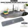 A silicone faucet drain mat is shown in various forms, including a slotted tray and a flat mat, used to protect countertops.