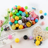 A bowl filled with 45 silicone 3D animal beads in various colors like green, yellow, pink, and blue for jewelry making.