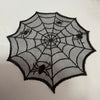 Black disposable spider web Halloween table runner or placemat set