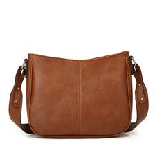 A brown classic PU leather crossbody shoulder bag with a smooth finish and leather strap.