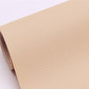 A roll of light beige self-adhesive PU leather repair patches, measuring 20 x 30 cm.