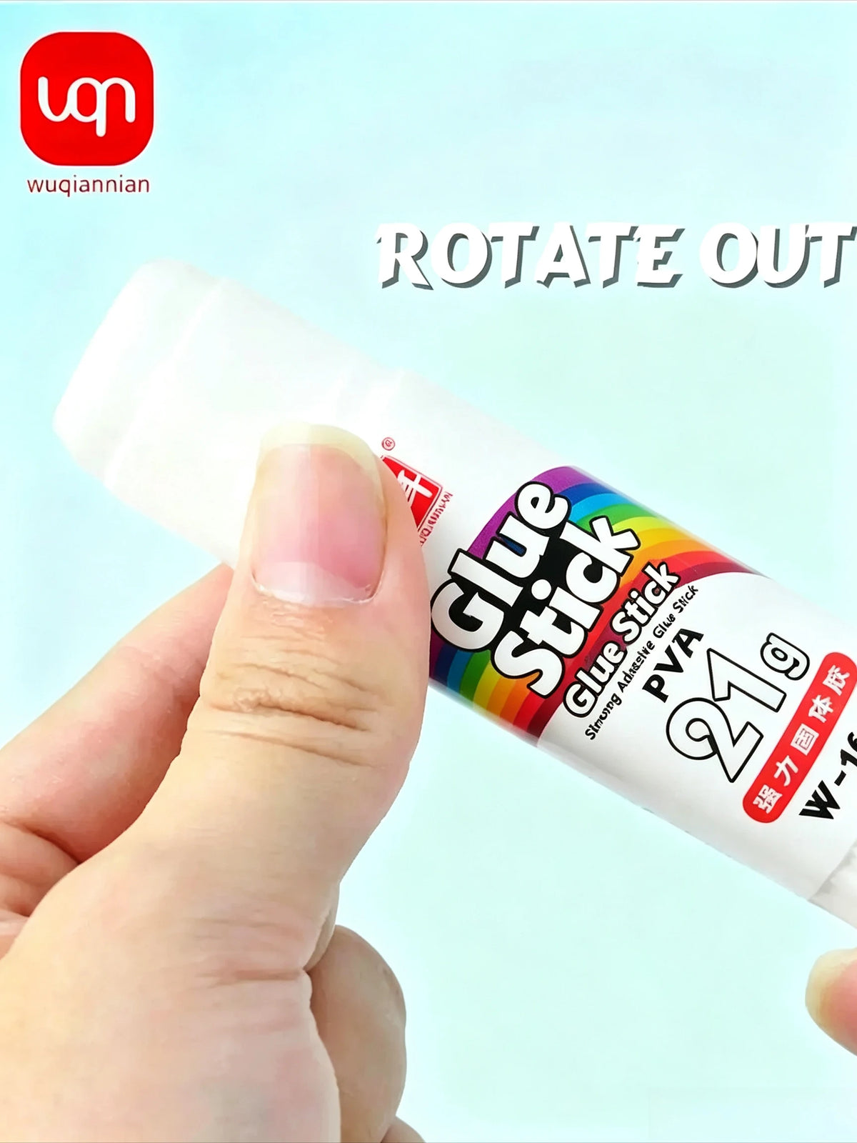 A hand is holding a white glue stick product labeled Glue Stick PVA 21g for crafts and office use.