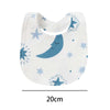 A white baby bib featuring blue stars and a crescent moon design.