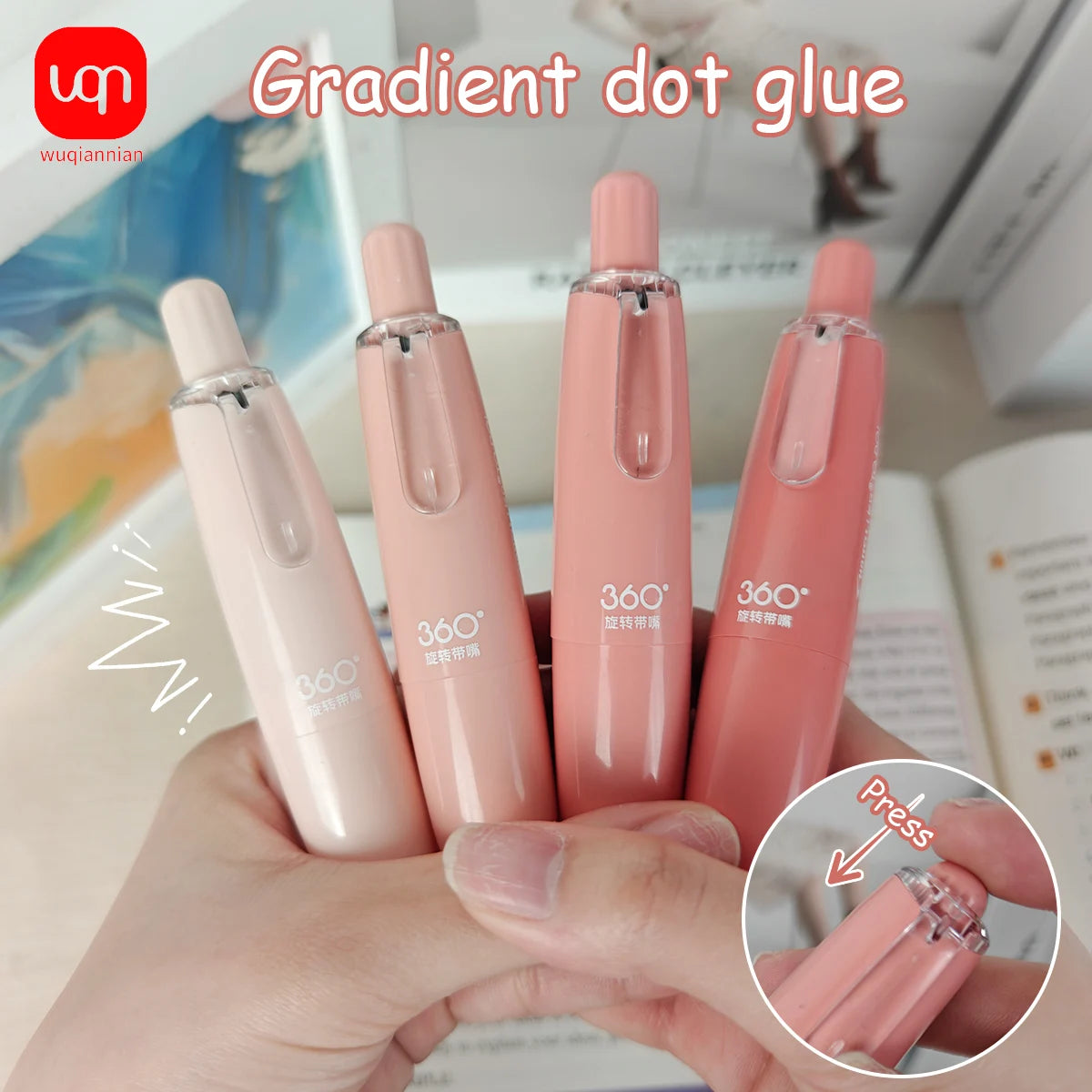 A set of four gradient dot glue pens in pink and nude shades being held by a hand.