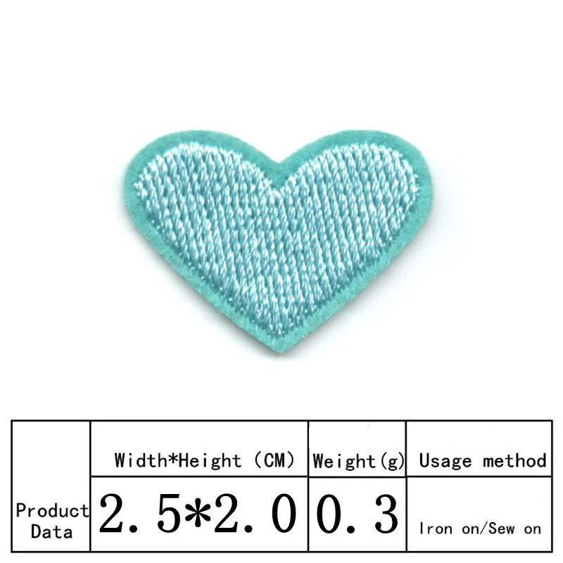 A light blue heart-shaped embroidered iron-on patch for clothing and crafts.