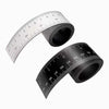 A black magnetic flexible measuring ruler with dual scales shown at an angle.