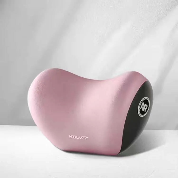 A pink memory foam car headrest and lumbar support pillow set resting on a white surface.
