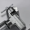 A close-up view of a gray clamp-on table vise with a swivel mechanism and mounting rods.