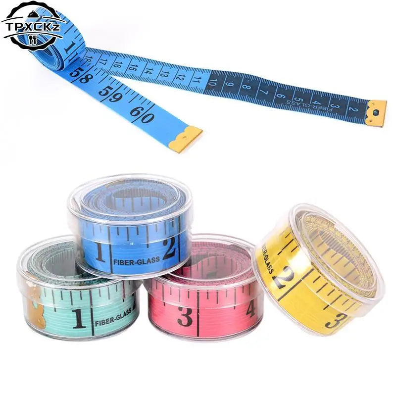 A set of soft flexible tape measures in blue and yellow, including a long measuring tape and several rolls for sewing and bod