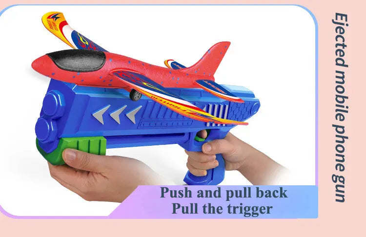 A child holds a red and yellow foam plane launcher toy gun designed for outdoor play.