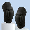 A pair of black thickened sports knee pads shown on white display stands.