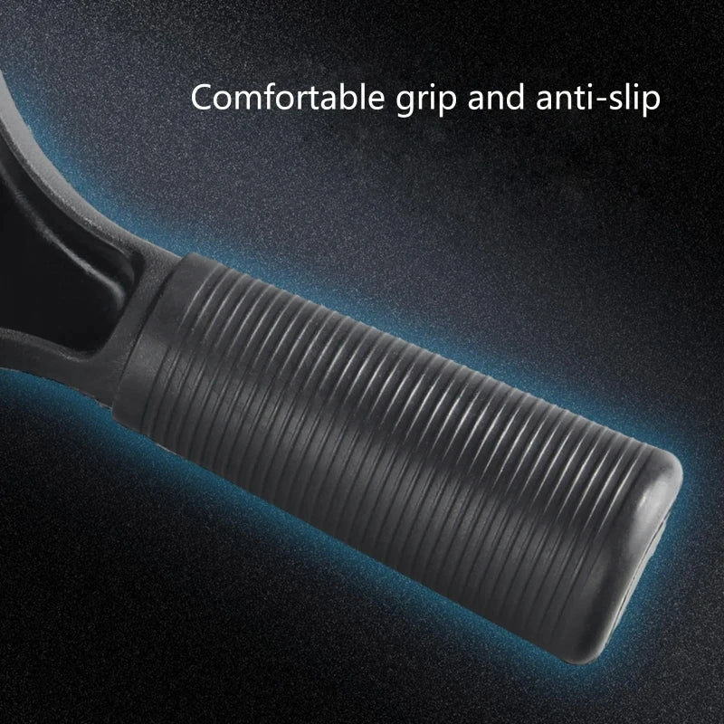 Close-up of a black car window squeegee with a textured grip and anti-slip features.