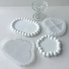 White silicone bubble tray molds for resin gypsum and clay crafts displayed on a white surface.