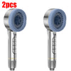 Two silver handheld shower heads with silicone nozzles are shown against a white background.
