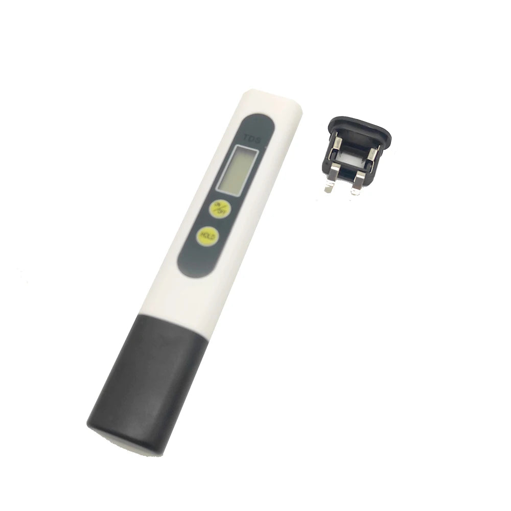 A white digital TDS water quality tester with a black handle and a separate charging/connection plug.