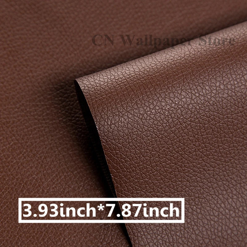 A close-up of a brown leather material showing a stitched texture and a measurement label.