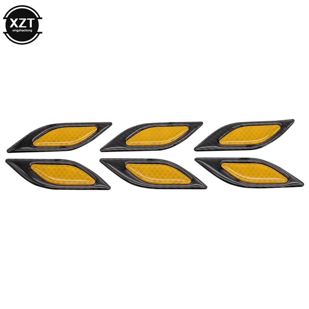 A set of six black and yellow reflective carbon fiber car styling strips.